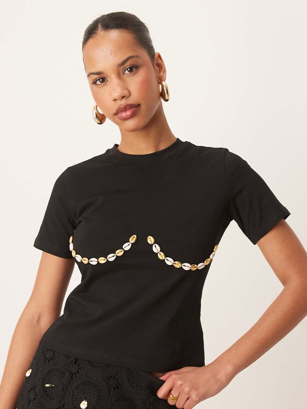 Never Fully Dressed Black Short-Sleeve Tee with Gold Shell Detail